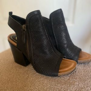 Isola chunky heel sandals.